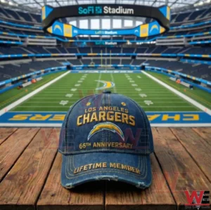 Los Angeles Chargers anniversary baseball cap positioned in front of a football field inside a large modern stadium!