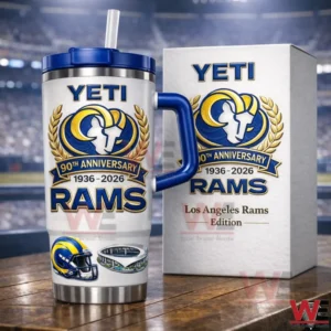 White Los Angeles Rams anniversary insulated travel mug with blue lid handle and straw beside a matching white gift box with a stadium background!