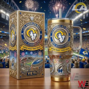 A gold styled insulated tumbler and matching box featuring Los Angeles Rams NFC Champions design with stadium fireworks and detailed ornamental elements!