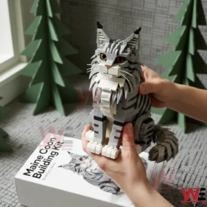 Maine Coon Cat Building Brick Cats 5 Hands holding a Maine Coon cat building brick figure in an indoor decorative environment!