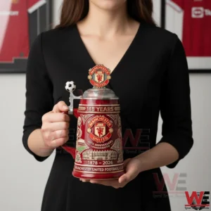Woman holding a Manchester United commemorative stein!