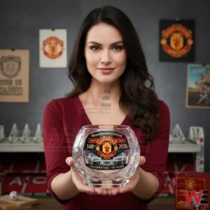 Woman holding Manchester United anniversary crystal football glass!