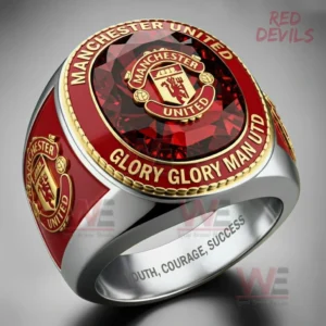 Silver Manchester United ring with a large red gemstone top Manchester United crest red and gold text rim side emblem details and Youth Courage Success engraving inside!