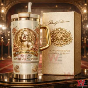 Luxury gold tumbler with vintage style artwork and matching embossed gift box displayed in an elegant theater environment with warm glowing lights!