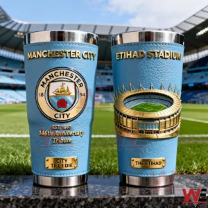 Two Manchester City insulated tumblers with light blue textured exterior gold lettering club crest anniversary tribute and a three dimensional Etihad Stadium design displayed on the football field!