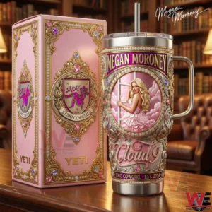 Pink Megan Moroney Yeti tumbler with ornate design displayed next to matching box!
