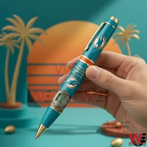 Miami Dolphins 60th Anniversary 1966-2026 Pen 7 Hand holding a teal Miami Dolphins sixtieth anniversary ballpoint pen with gold accents team logo anniversary text and stadium themed artwork in a tropical background.