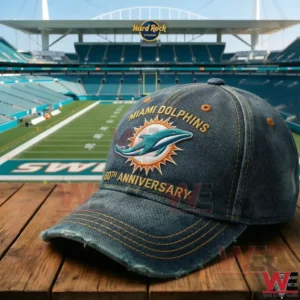 Miami Dolphins anniversary cap displayed on wood with a football stadium in the background!