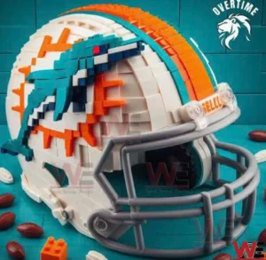 Miami Dolphins NFL Helmet Building Blocks Set 3 A side view of a Miami Dolphins NFL helmet created from building blocks placed on a table showing the logo stripes and face guard clearly!