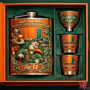A boxed anniversary flask set with one large illustrated flask and three matching metal cups arranged in a green felt interior with orange and green themed artwork celebrating a one hundred year milestone!