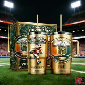 Two gold Miami Hurricanes anniversary tumblers with straws and a collector box on a football field in a stadium at night featuring mascot artwork and University of Miami emblem.