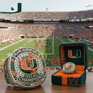 Miami Hurricanes championship ring with U logo orange and green accents clear stones and 2025 ACC Champions text shown with a presentation box and stadium background