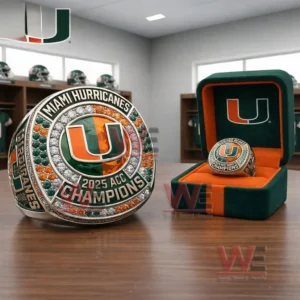 Miami Hurricanes 2025 ACC Champions Ring 3 Miami Hurricanes 2025 ACC Champions ring with U logo gemstone border green and orange accents displayed with a matching presentation box in a locker room background