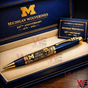 Michigan Wolverines anniversary pen in a navy and gold gift box with 147th anniversary text and an engraved wolverine detail.