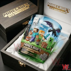 Minecraft fifteen year anniversary whiskey glass with block characters and creatures placed inside a wooden gift box with soft fabric lining!
