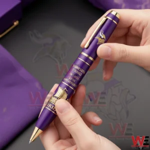 Minnesota Vikings 65th Anniversary 1961-2026 Skol Vikings Pen 4 Hands holding a purple and gold Minnesota Vikings 65th anniversary commemorative pen with team logo and anniversary text!
