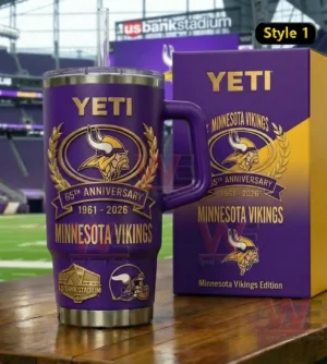 Purple insulated tumbler with handle and straw featuring Minnesota Vikings sixty fifth anniversary graphics next to a matching collector box on a wooden table with a football stadium background!