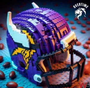 A purple Minnesota Vikings style football helmet constructed from building blocks resting on a surface with small footballs around it and shown from a side angle!