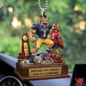 Hanging car ornament featuring a bobcat football mascot celebrating a championship with trophy and rivals in a scenic background!