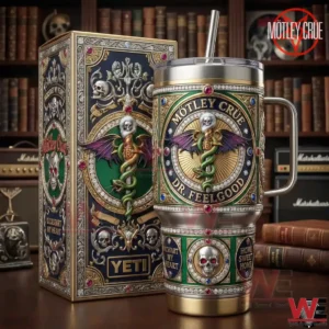 A decorative rock themed metal tumbler with intricate artwork standing next to a matching box in a warm vintage background!