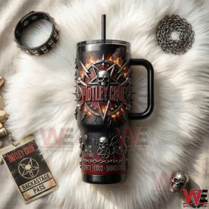 Motley Crue Unity Loud Dangerous 40oz Tumbler With Handle 5 Overhead view of a dark rock themed tumbler with handle featuring a skull emblem on a white fur background with accessories!