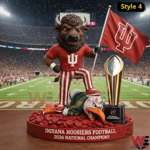 A triumphant Indiana Hoosiers mascot stands with a flag and trophy on a football field!