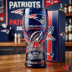 Patriots 2025 AFC Champions commemorative pint glass standing on a wooden surface with matching box and New England Patriots decor in the background!