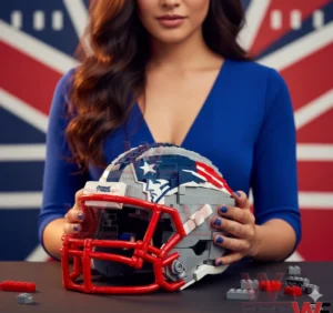 A block built New England Patriots style football helmet with red facemask and detailed logo design displayed on a table while being held by a woman wearing blue clothing!