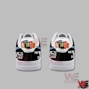 Back view of two low top sneakers showing NKOTB logo patches on the heels and repeating New Kids On The Block text on black panels above white midsoles!