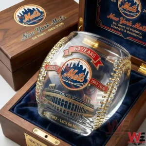 A detailed New York Mets anniversary whiskey glass with gold etched graphics baseball stitching accents and a luxury collectors box background!
