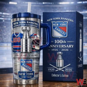 New York Rangers one hundredth anniversary handled tumbler with straw beside collector edition box in a hockey arena featuring Stanley Cup graphic team logo goalie mask and the years one nine two six to two zero two six!