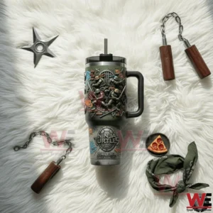 Green handled tumbler with embossed Ninja Turtles characters on white fur surrounded by throwing star nunchucks chain and a pizza slice accessory!