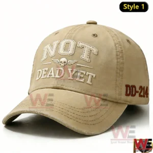 Angled front view of a beige baseball cap with bold embroidered lettering and a structured curved brim!