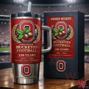 Ohio State Buckeyes 136th Anniversary 1890-2026 Tumbler 5 Red Ohio State Buckeyes Football insulated tumbler with handle straw and matching gift box showing 136 Years 1890 2026 design on a table with a blurred stadium background!