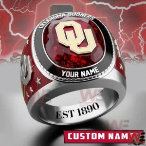 Silver Oklahoma Sooners ring with red gemstone top raised gold OU logo Oklahoma Sooners text custom name area star accents and Est 1890 engraving inside!