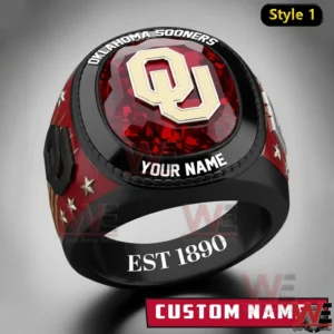 Black Oklahoma Sooners ring with red gemstone top raised gold OU logo custom name text star accents and Est 1890 engraving inside the band Style 1!