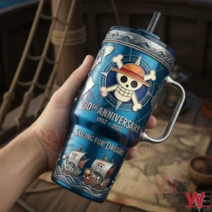 Hand holding a One Piece thirtieth anniversary tumbler with pirate skull icon sailing ships and blue ocean inspired design!