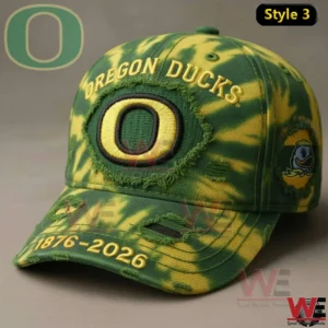 Green and yellow Oregon Ducks anniversary cap with embroidered logo and camo pattern!