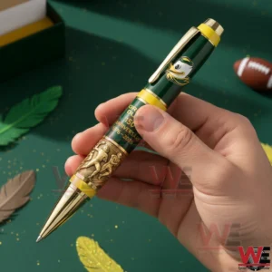 Hand holding a Oregon Ducks pen with themed background!