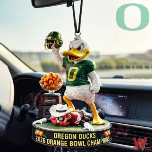 Oregon Ducks hanging car ornament with duck mascot in green jersey holding a helmet next to a trophy bowl of oranges and a base reading Oregon Ducks two thousand twenty six Orange Bowl Champions inside a car!