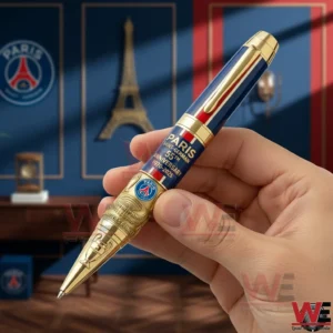Paris Saint Germain 55th Anniversary 1970-2025 Pen 3 Hand holding a blue and gold Paris Saint Germain anniversary pen with decorative background!