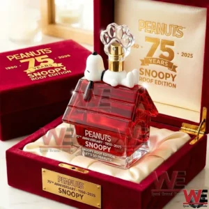 Peanuts 75Th Anniversary Snoopy House Roof Perfume Bottle 5 A Peanuts anniversary Snoopy perfume bottle showcased in a deluxe box with commemorative details and refined presentation!