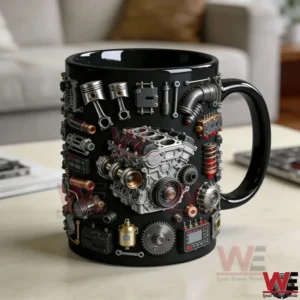 Black ceramic mug with engine part embossing placed on a table in a living room!