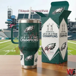 Green Eagles tumbler with handle and straw beside a matching gift box showing Super Bowl LII and LIX two time champions text with a football stadium background!