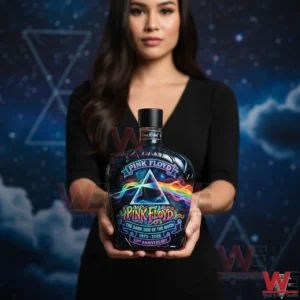 Woman holding a Pink Floyd themed whiskey bottle with cosmic background!
