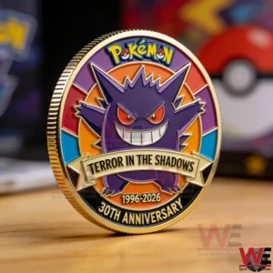 Pokemon Gengar anniversary coin on a wooden surface!