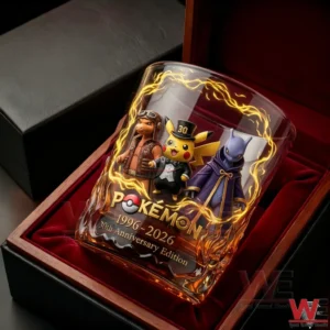 Pokemon anniversary whiskey glass with character figures and electric effects placed inside a wooden box with red fabric lining!