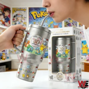 Pokemon anniversary tumbler being used with straw in a collector room!