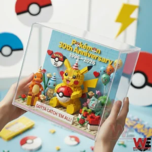 Pokemon 30th Anniversary Brick Display Set 3 Hands holding a clear case with a Pokemon themed brick anniversary display featuring Pikachu classic characters and festive decorations!