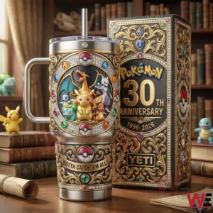 Decorative metal tumbler with Pokemon characters and ornate patterns displayed next to a themed presentation box on a wooden desk!